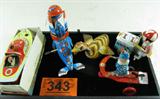 Lot of 5 Tin Litho Windup Toys Schylling & Blic
This lot contains 5 vintage reproductions of wind-up tin litho toys:
- Made by Blic, a whimsical circus clown on a three wheeled scooter. Toy has one tin wheel and one rubber wheel. The original toy was called "Roli Zoli". Measures 5" tall and 4.5" long.
- A wind up ice cream pedal cart. When wound up the vendor pedals the cart. Made in China. Measures 4.25" tall x 4" long.
- A friction operated toy duck. The cute little duck has brown and white feathers and a blue ribbon around his neck. Measures 3" tall x 4.5" long.
- An adorable little circus seal who balances a whirly-bird ball on his nose. Wind him up and the whirly bird goes round and round as the seal moves in circles. Measures 5.5" tall and 5" long.
- Schylling steam powered engine speed boat. Appears to be new in the original box and unused with everything you'll need to operate the boat. Instructions on the box are to fill one exhaust pipe with water, float the boat in water, pu