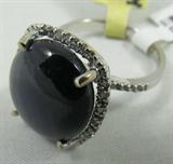 Jewelry 14K White Gold Sapphire Diamond Ring GLA
Breathtaking 14K white gold, sapphire & diamond ring. Included Gemological Laboratory of America (GLA) Premium Appraisal reads:
"One lady's polished, stamped & electronically tested solid 14K white gold ring mounted with: 1 Genuine blue star sapphire (corundum) and 46 genuine round full diamonds. This item weighs 5.97 grams and fits a finger size 6.25. The setting measures 17.03 x 14.99 mm and the band measures 4.79 mm tapering down to 2.69 mm at the center of the shank. The condition is BRAND NEW. The gemstones have been analyzed in the mounting.
MAIN GEMSTONE
Identity: Genuine Blue Star Sapphire (Corundum)
Shape: Oval (Cabochon)
Measurements: 14.97 x 12.88 x 6.00 mm
Quantity: 1
Carat weight: 12.77 cts
Clarity Type: II = may include eye-visible features
Hue: Blue
Transparency: Opaque
Tone: Dark
Saturation: Moderate-strong
Polish: 9-Excellent
Finish: 6 - Very Good
Phenomena: Asterism
Quality: 6 - Good to Very Good
ADJACENT GEMSTONE
Ident