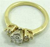 Jewelry 14kt Yellow Gold Diamond Engagement Ring*
Gorgeous 14kt yellow gold engagement ring featuring a large prong set diamond. Included Labtrade Gemological Laboratory report reads: "One stamped 14kt yellow gold lady's engagement ring. Containing: One round brilliant cut diamond approximate weight of 0.55cts. Clarity VS-2 Color I. Six round brilliant cut diamonds approximate total weight of 0.20cts. Clarity VS1-VS2 Color G-H. Total weight of ring 3.06gm". Ring size: 6.75, total weight: 2.0 dwt.
*Reserve Item