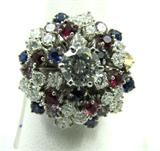 Jewelry 14kt Gold Diamond Sapphire & Ruby Ring*
Gorgeous 14kt white gold cocktail ring featuring red white and blue stones, perfect to wear on the Forth of July! Included Labtrade Gemological Laboratory report reads: "One stamped 14kt white gold lady's cluster ring. Containing: One round brilliant cut diamond approximate weight of 0.65cts. Clarity VS-1 Color J. Twenty-Eight round brilliant cut diamonds approximate totla weight of 1.85ctws. Clarity VSI-VS2 Color I-J. Nineteen round cut natural Alexandrites, rubies, blue sapphires approximate total weight of 2.00cts. Weight of ring 9.89 gm.". Ring size: 6, total weight: 6.3 dwt.
*Reserve Item