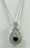 Jewelry 14KT White Gold Black Diamond Necklace
Lovely white gold black diamond necklace. Included Gemological Laboratory of America (GLA) Premium Appraisal reads:
"One lady's polished, stamped and electronically tested solid 14KT white gold pendant mounted with: 1 genuine round black diamond and 51 Genuine Round Full Diamonds. This item weighs 4.47 grams and measures 24.21 mm in length and 12.98 mm in width, tapering to 4.11 mm and includes a chain which measures 18.00 inches in length and 0.88mm in width. The chain has been finished with a lobster-claw closure. This pendant and chain combined weighs 4.47 grams. The condition is BRAND NEW. The gemstones have been analyzed in the mounting.
Main Gemstone
Identity: Genuine Black Diamond
Cut: Round (faceted)
Measurements: 5.91 x 4.60 mm
Quantity: 1
Carat Weight: 1.14 cts (est.)
Clarity Grade: Opaque
Color Grade: Black
Adjacent Gemstone
Identity: Genuine Diamond
Cut: Round Full (Faceted)
Measurements: 1.90-1.00 mm (no depth) (Range)
Quantit