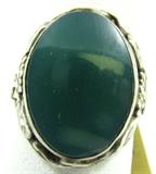 Jewelry Sterling Silver Green Onyx Fashion Ring
Lovely sterling silver ladies' fashion ring, featuring a deep green onyx stone, consignor states is genuine, in a silver bezel with embossed flower designs throughout. No visible signatures, consignor states item is sterling silver, fits a finger size 7.25.
Total weight: 0.12 ozt.