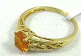 Jewelry 14kt Yellow Gold Fire Opal Ring
Gorgeous 14kt yellow gold fashion ring featuring a vibrant fire opal stone in prong setting, accented with ribbon cut out designs in the band. Marked "14k", ring size: 6.75. Total weight: 1.2 dwt.