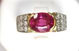 Jewelry 18kt White Gold Rubellite & Diamond Ring
Stunning 18kt white gold cocktail ring featuring a large oval shaped rubellite stone and small diamonds, with yellow gold accents. Included Labtrade Gemological Laboratory report reads: "One stamped 18kt white gold lady's ring with yellow gold head. Containing: One oval cut natural rubellite approximate weight of 3.00cts. Forty round brilliant cut diamonds approximate total weight of 1.00cts. Clarity SI-2 to I-2 Color I-J. Total weight of ring 9.97gm". Ring size: 7, total weight: 6.4 dwt.