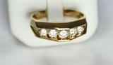 Jewelry 14kt Yellow Gold Diamond Wedding Band
Stately 14kt yellow gold wedding band. Included Labtrade Gemological Laboratory report reads: "One stamped 14kt yellow gold man's wedding band. Containing: Five channel set round brilliant cut diamonds approximate total weight of 1.00cts. Clarity SI1 to SI2 Color I-J. Total weight of wedding band 9.37 gm". Ring: 10.5, total weight: 6.0 dwt.