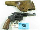 Gun Smith & Wesson US Army 1917 45 DA Revolver
Vintage Smith & Wesson Model US Army 1917 45 ACP Double Action Revolver. Features fixed sights, double action, smooth walnut wood grips, capacity 6. Barrel length is 5 1/2" overall length is 10 1/2". On top of barrel it says Smith & Wesson Springfield Mass USA. Patented DEC. 17, 1901 FEB 6, 1906 SEP 14,1909. Has United States Property on under barrel. Matching Serial numbers. Used with period holster.