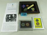 "Medal of Honor" Recipient Memorabilia
CPL Duane E. Dewey was awarded the Medal of Honor for his actions on 16 Apr 1952 in Korea. The items include two 4"x6" framed Medal of Honor Society Coin, Unit Coin; 8"x10" framed Medal of Honor Society Coin, Unit Coin, Unit patches, & Korean grenade replica; printed copy of the citation; and a Xerox of photo of CPL Dewey & President Eisenhower.