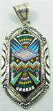 Jewelry Intricate Mosaic Sterling Silver Pendant
Exquisite sterling silver pendant featuring several colorful inlaid gemstones in a beautiful mosaic Southwestern style pattern, bordered by lovely metalwork. Some stones included: opal, onyx, mother of pearl, malachite, turquoise and more! Amazing detail! Marked / signed "SY sterling", measures: 3.25" long. Total weight: .86 ozt.
See a similar item, lot #377