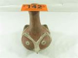Native American Indian Character Pottery Urn/Vase
A unique piece of Native American Indian pottery which appears to be hand crafted and features an owl face on two sides of the bowl. There is a chip on one side of the rim. The pottery is not signed nor dated. Measures 9.5" tall.