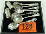 Mixed Silverplate Spoons & Salt / Pepper Shakers
A fantastic lot of silver plated items which include:
- 7 sugar shell spoons. Each spoon has a unique pattern. All spoons measure between 5.5" to 6" long. Markings on the spoons include, "Panama Silver", "International Deep Silver", "1847 Rogers Bros - XS Triple", "Wm. A. Rogers A1", "1881 Rogers Oneida", and "M.H.M - X".
- A pair of salt & pepper shakers marked Wm. Rogers Mfg Co. Each measures 2.25" tall.