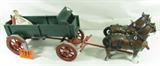 Model / Toy Buckboard Wagon Clydesdale Horse Team
Complete your model wild west town / cowboy display with this fantastic replica / toy buckboard wagon and its team of two hard plastic Clydesdale horses. A little bonneted doll is along for the ride. Shows signs of wear from age and use. Measures 9" tall x 30" in length x 9" across.