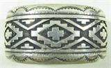 Jewelry Large Sterling Silver Cuff Bracelet
Fabulous large men's sterling silver cuff bracelet with Southwestern style geometrical pattern. Thick band, measures: 1.75" from wrist to elbow. Bracelet measures: 7" wide with 1.25" opening. Signed / marked "Tc Singer sterling". Total weight: 3.32 ozt.