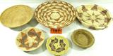 Lot of 6 Native American Indian Woven Baskets
This is a fantastic lot which contains 6 southwestern style baskets which appear to be authentically hand woven by Native American Indians. All items are in used condition. Lot includes:
- A single color basket with no pattern but it does have a woven rim. Measures 1.5" tall with a 6.5" diameter.
- A small flat basket with a brown and black geometric design in the center. Measures 6.25" in diameter.
- A pretty basket with a orange color star shaped pattern in the bottom. Measures 1.75" tall x 8" in diameter.
- A solid color bowl shaped basket, measures 3" tall with a 11" diameter.
- A tray type basket with a star shaped pattern in the bottom and raised sides. Measures 2" tall with a 12" diameter.
- A tri-color basket with geometric design patterns. Measures 2" tall with a 14.75" diameter.