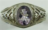 Jewelry Sterling Silver Purple Stone Cuff Bracelet
Fabulous sterling silver cuff bracelet featuring a large oval shaped purple faceted stone, possibly Amethyst. Bracelet has lovely hear filigree style design. Marked "925 with unknown maker mark. Measures: 6.25" wide with 1" opening. Total weight: 1.60 ozt.