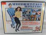 Art "Viva Las Vegas" Movie Poster Presley Margret
A fantastic 1997 reprint movie poster featuring Elvis Presley and Ann Margret in the Metro-Goldwyn-Mayer film "Viva Las Vegas". The poster is framed and ready to display. Measures 27" x 33.75".
From the internet: "Viva Las Vegas (also known as Love in Las Vegas) is a 1964 American romantic musical movie starring music icon Elvis Presley and actress Ann-Margret. The film is regarded by fans and by film critics as one of Presley's best movies, and it is noted for the on-screen chemistry between Presley and Ann-Margret. It also presents a strong set of ten musical song-and-dance scenes choreographed by David Winters and featuring his dancers, and a reasonably interesting story. Viva Las Vegas was a hit at movie theaters, becoming the number 11 movie in the list of the Top 20 Movie Box Office hits of 1964. Lucky Jackson (Elvis) goes to Las Vegas, Nevada to participate in the city's first annual Grand Prix Race. However, his race car, an Elv