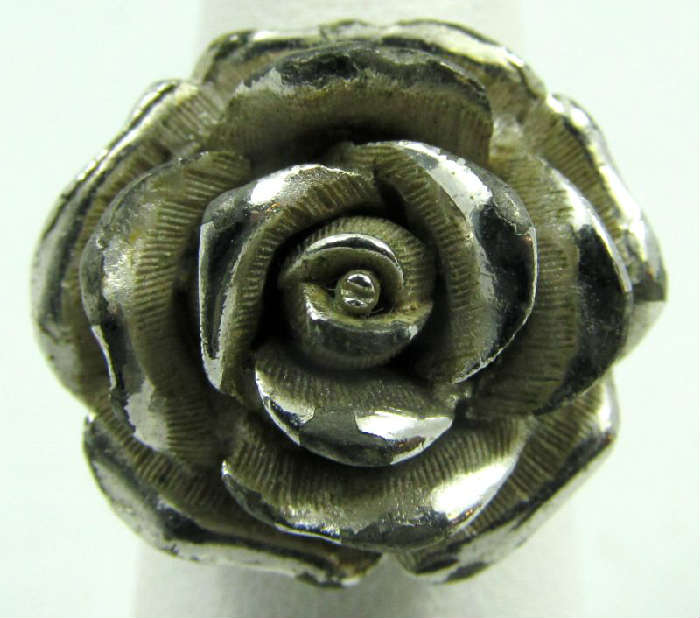 Jewelry Trifari Rose Fashion Ring
Gorgeous Trifari fashion ring with intricate rose design. Marked "Trifari", measures: 6.