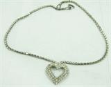 Jewelry Vintage Heart Rhinestone Necklace
Beautiful vintage rhinestone covered costume necklace with heart shaped pendant. Measures: 16.5" long.