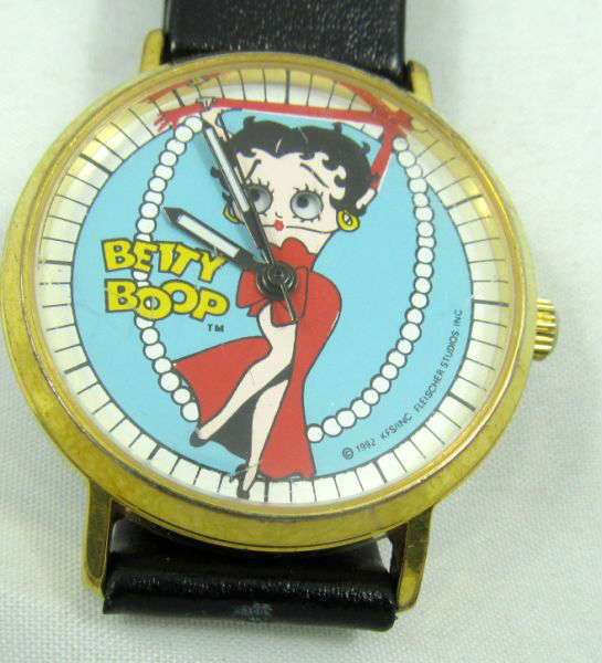 Jewelry Betty Boop Cartoon Fashion Watch
Darling Tali Betty Boop cartoon fashion watch with moving eyes. Unknown working condition. Marked "Tali 1992 KFS / Fleischer".
