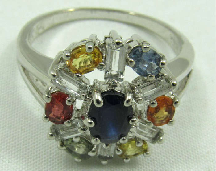 Jewelry Sterling Silver Colorful Fashion Ring
Beautiful sterling silver fashion ring featuring colorful and clear sparkly gemstones. Marked "925", ring size: 11. Total weight: .17 ozt.