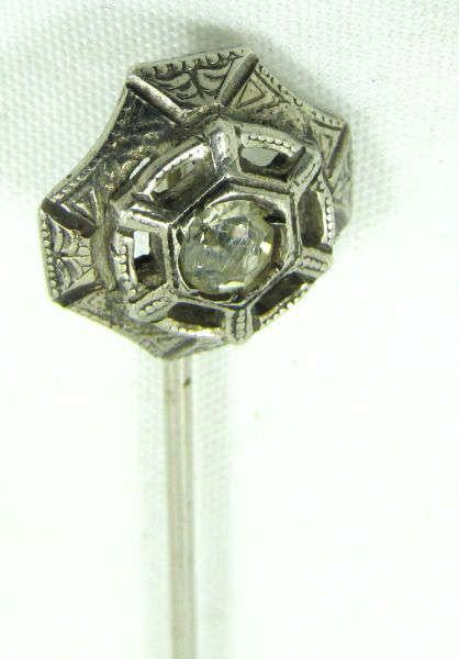 Jewelry Sterling Silver Stick Pin with CZ
Vintage sterling silver stick pin / hat pin with sparkly clear Cubic Zirconia / rhinestone. Marked "ster", measures: 2.5" long.

ZB4148