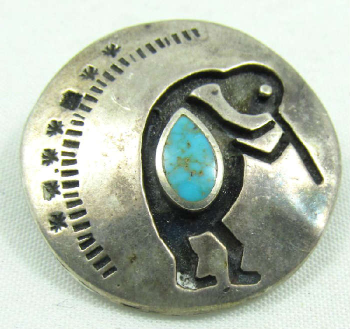 Jewelry Sterling Silver & Turquoise Brooch
Darling sterling silver brooch / pin with Kokopelli style design accented with a turquoise stone. Unmarked, tests as sterling silver. Measures: 1" diameter, total weight: .29 ozt.