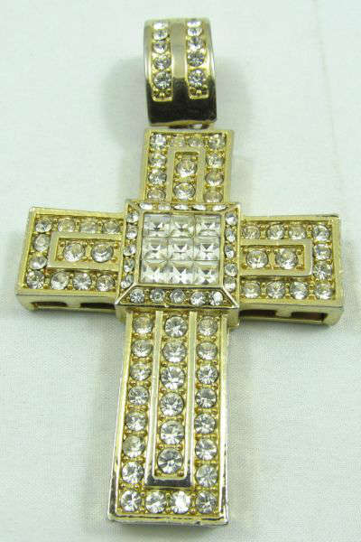 Jewelry Large Rhinestone Cross Costume Pendant
Huge gold toned cross shaped costume pendant / medallion covered in clear sparkly rhinestones. Unknown maker, measures: 3.5" long.