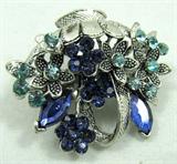 Jewelry Flower Basket Brooch / Pin
Gorgeous silver toned flower basket shaped brooch / pin accented with blue rhinestones. Unknown maker, measures: 1.5" wide.
