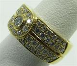 Lot#: 300
Description: Jewelry 18kt Yellow Gold Di Modolo Diamond Ring
Elegant 18kt yellow gold ring covered in round brilliant cut diamonds. Band has cut design going through the center of the ring. Marked "Di Modolo 750", ring size: 4.75. Total weight: 7.3 dwt.