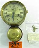 Lot#: 277
Description: Seth Thomas Bottom Bell Ships Clock "Monitor"
Vintage Seth Thomas 30 hour Ships Bell Clock, "Monitor". This nautical wall clock has a key wind, hinged front bezel, and brass case and bell mounted to wood plaque (possibly mahogany). This model uses the No. 7, one day bell-strike movement. Marked “Chas C. Hutchinson, Boston USA; Seth Thomas” on the face / dial has Roman numerals and shows some wear around the key holes. In great condition with a lovely patina, it has been repaired to working order in 1993 and the key is accounted for. The back still has the original paper label with only partial wear to the edge. Measures 10.5" long x 6.5" wide x 3.25" deep.