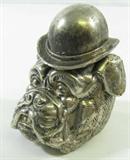 Lot#: 214
Description: Vintage Metal English Bulldog Figural Inkwell
Gorgeous old figural English bulldog with top hat spelter metal inkwell. It features a cast dog’s head with a hinged top hat lid. Probably modeled after British Prime Minister Winston Churchill who was often referred to as the “British Bulldog” even though the only dogs he owned were poodles. The original glass inkpot is missing but otherwise it is in good vintage condition with some scratches and one dent in the back of top hat. It measures 3.25” wide x 3.5” tall
Z14 EAK
http://azfirearms.auctionflex.com/showlot.ap?co=10355&weid=31649&weiid=11942930&keyword=inkwell&lso=pricedesc&pagenum=1&lang=En