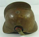 Lot#: 83
Description: Vintage Metal Merryweather Firefighter Helmet
Antique metal Merryweather, Pickelhaube firefighter helmet. This helmet is possibly made out of copper or brass, it is missing the front insignia plate and one of the metal chinscale straps. The original leather liner is still intact, but is pretty worn. It features a brass rib or fin from the rear to the crown, the left side chinscale with circular metal and crimped edge black and red colored Oldenburg Province Cockade / Kokarden / Roundel. In vintage condition with some dents, missing pieces and verdigris. Measures 10.25" long x 8" tall. A great piece of antique European military, fire brigade memorabilia.
Tag words: German DIN fire helmet, cuirassiers, French military, Adrian
Z14 EAK
http://azfirearms.auctionflex.com/showlot.ap?co=10355&weid=31649&weiid=11871140&keyword=helmet&lso=pricedesc&pagenum=1&lang=En