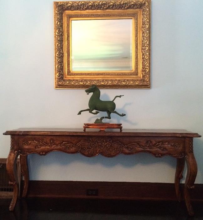 Gilt Framed, Beveled Mirrors; Patinated Iron Horse on fitted Stand; Hand Carved Console Table