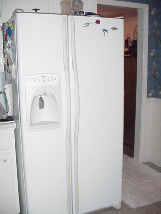 Amana Refrigerator, side-by-side in white