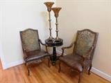 John Richard drum table with mirror top, pr. old world style arm chairs, 2 tall candle holders