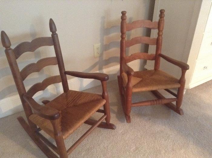 Pair of small rush seat rocking chairs