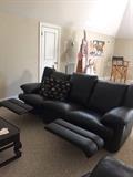 Black leather recliner sofa