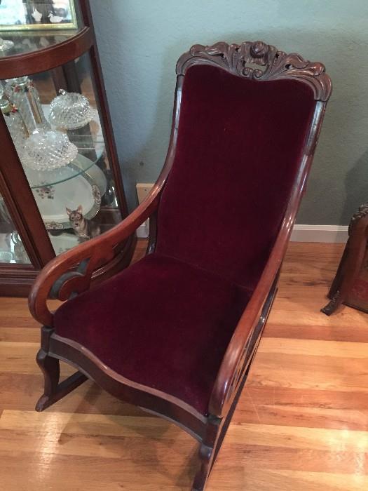 Antique carved wood rocking chair