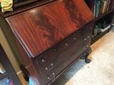 Antique wood secretary with claw foot legs