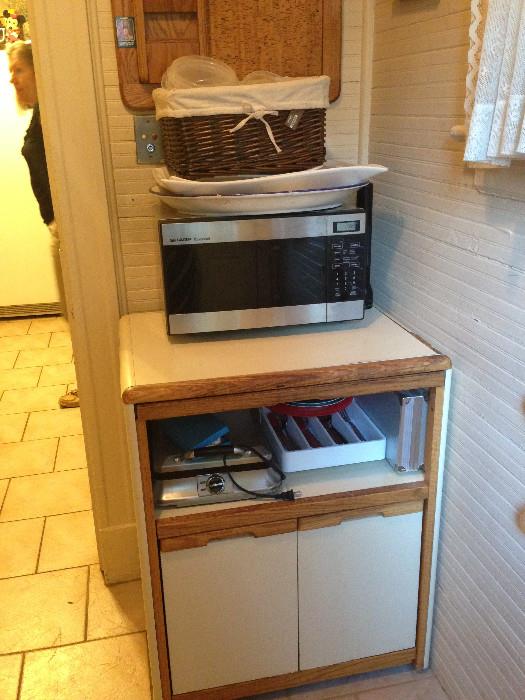Microwave, stand and contents.