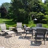 Patio furniture including this outdoor wicker table and chairs.