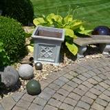 Outdoor decor items, garden accent pieces, planters, etc