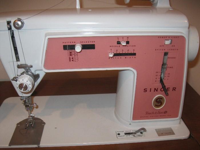 Singer sewing machine and cabinet and chair - $30