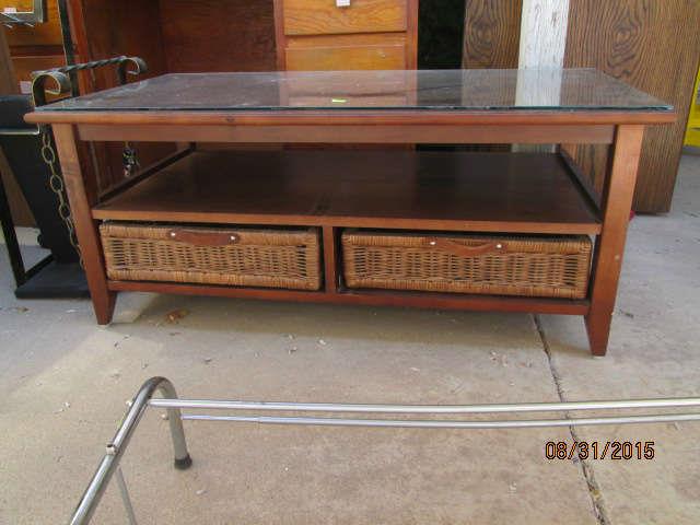 Coffee table with wicker drawers