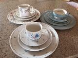Syracuse China (Meadow Breeze pattern)     Heber Porcelain (Blue Flower pattern)    and Farberware Stoneware (English Garden pattern)
