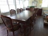FANTASTIC SOLID CHERRY TABLE W/2 BUILT IN LEAVES ON THE ENDS. 8 CHAIRS ARE MADE BY CENTURY SOLD SEPARATELY