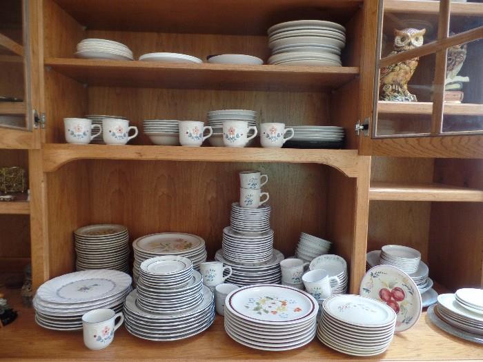 tons of sets of dishes.