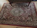 Small entry size wool rug.