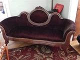 Victorian velvet settee. Very sweet and would make an inviting impression for any home.