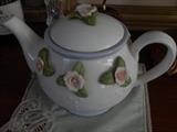 Tea pot with rose buds applied ceramic.