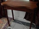 Wooden card table, folds in half to save space.